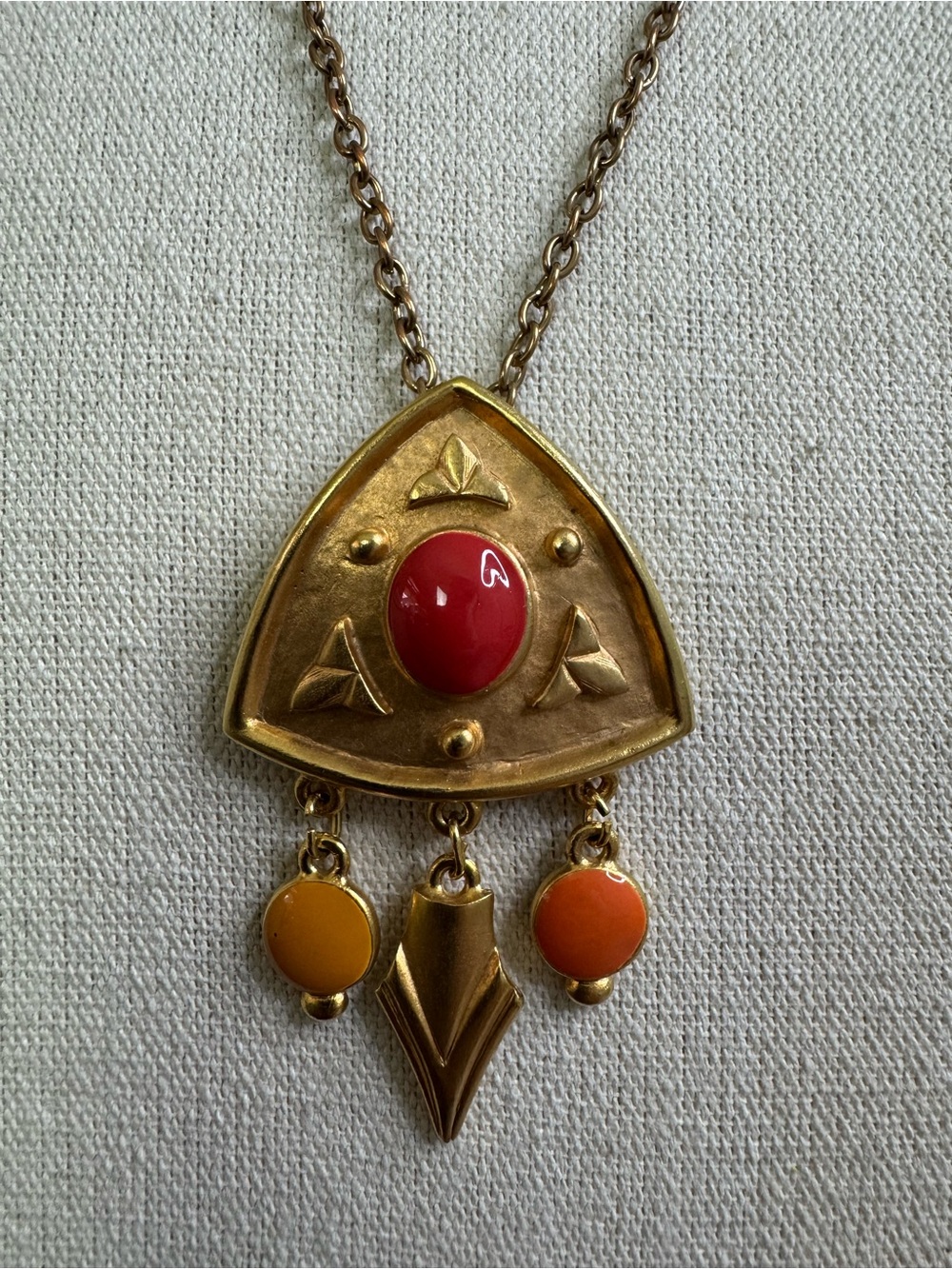 Gold-Tone Geometric Pendant Necklace with Red and Orange Accents